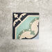 Single London Streets Goodwin Court 20x20cm Victorian Moroccan style porcelain tile displayed in a product setting, featuring an elegant geometric motif in soft blue, cream and charcoal tones inspired by traditional Victorian decorative floor tiles.