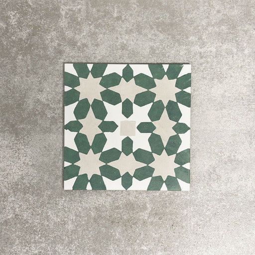 Souk Green C 20×20cm Moroccan-style porcelain tile with a green, white and beige geometric pattern.