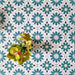 Clara Teal Victorian Moroccan-style porcelain tiles in a 20 × 20cm format, laid in a repeating pattern to showcase the teal and green geometric design across the surface.
