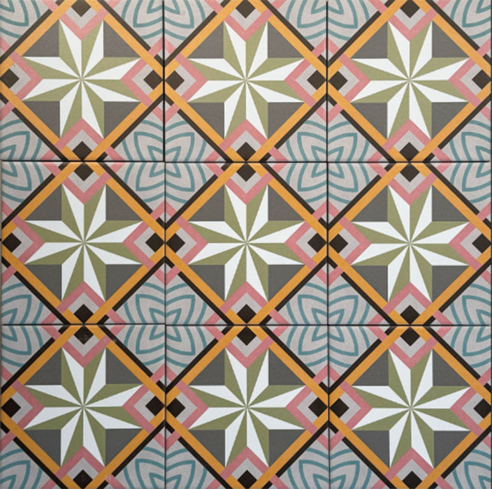 Cuba Star Mini Moroccan-style porcelain tiles in a 15×15cm square format, arranged in a repeating geometric star pattern with soft green, blue, pink and mustard tones, highlighting the tile’s crisp symmetry, fine detailing and decorative encaustic-style design.