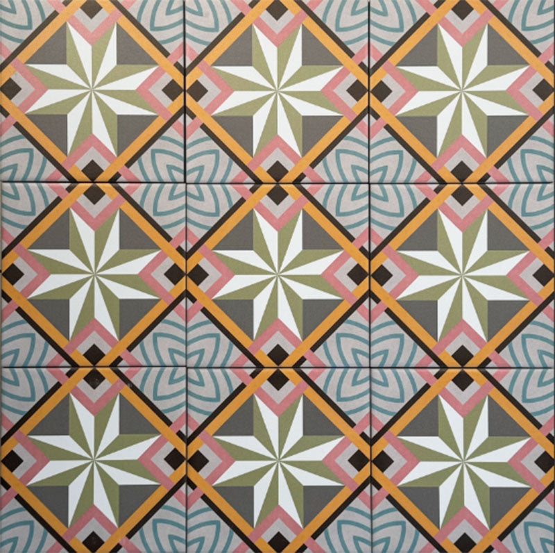 Cuba Star Mini Moroccan-style porcelain tiles in a 15×15cm square format, arranged in a repeating geometric star pattern with soft green, blue, pink and mustard tones, highlighting the tile’s crisp symmetry, fine detailing and decorative encaustic-style design.