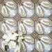 Viscount Langholme Place 20×20cm Victorian-style porcelain wall and floor tiles laid in a repeating ornate floral and geometric pattern with octagonal detailing in soft blue, sage green, warm red and cream tones, shown as a full tile layout with subtle tonal variation and floral styling.