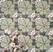 Nantes Green Moroccan-style patterned tiles in a 20x20cm format, arranged in a repeating grid to showcase the full design. The soft green floral motif is paired with mosaic-effect detailing in muted greys, creams and white, styled with delicate pink blossom accents to highlight the decorative, vintage-inspired pattern.