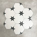 Group layout of Polaris Black Star Hexagon Moroccan-style porcelain tiles in a 22 × 25cm format, arranged to show the repeating star motif created by the white hexagonal tiles with contrasting black star detailing, highlighting the overall pattern effect for wall and floor installations.