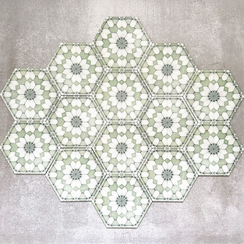 Grouped layout of Medina Soft Green Moroccan-style hexagon porcelain tiles, 18.7 × 21.6 cm, displaying the full repeating geometric pattern in soft green and white tones on a neutral background.