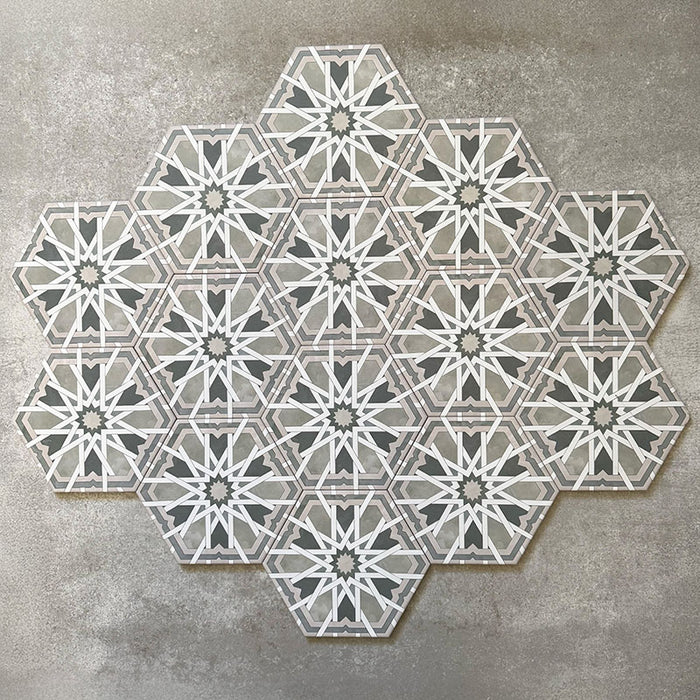 Grouped layout of Medina Hormuz Sage Green/Grey Moroccan-style hexagon porcelain tiles, 18.7 × 21.6 cm, showcasing the full repeating star-inspired geometric pattern in sage green, grey and white tones on a neutral background.