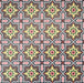 Cuba Havana Mini Moroccan-style porcelain tiles in a 15×15cm square format, arranged in a repeating geometric pattern with navy backgrounds and pink, green and mustard detailing, showcasing the tile’s intricate encaustic-style motifs and bold decorative symmetry.