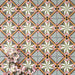 Cuba Star Mini Moroccan-style porcelain tiles in a 15×15cm square format, arranged in a repeating geometric star pattern with soft green, blue, pink and mustard tones, highlighting the tile’s crisp symmetry, fine detailing and decorative encaustic-style design.