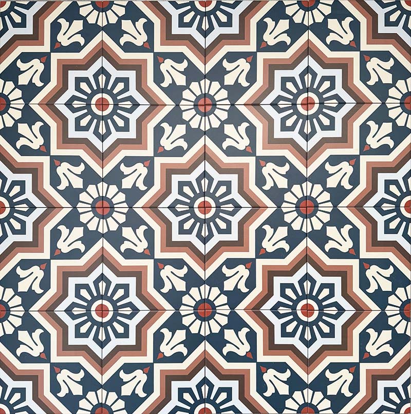Patterned layout of Balthazar Grand 20×20cm Moroccan-style porcelain tiles, showing the full repeating encaustic-inspired geometric design in deep blue, warm brown and cream tones, ideal for creating bold statement floors or feature walls.