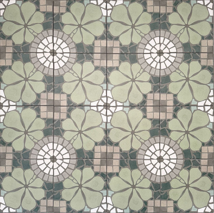 Nantes Green Moroccan-style tiles in a 20x20cm format, shown as a full repeating pattern layout. The design features soft green floral motifs combined with circular mosaic-style detailing and neutral stone-effect tones, creating a balanced, decorative floor or wall tile pattern inspired by traditional Moroccan designs.