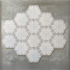 Grouped layout of Medina Hormuz Snow White Moroccan-style hexagon porcelain tiles, 18.7 × 21.6 cm, showcasing the full repeating star-inspired geometric pattern in white and soft grey tones on a neutral background.