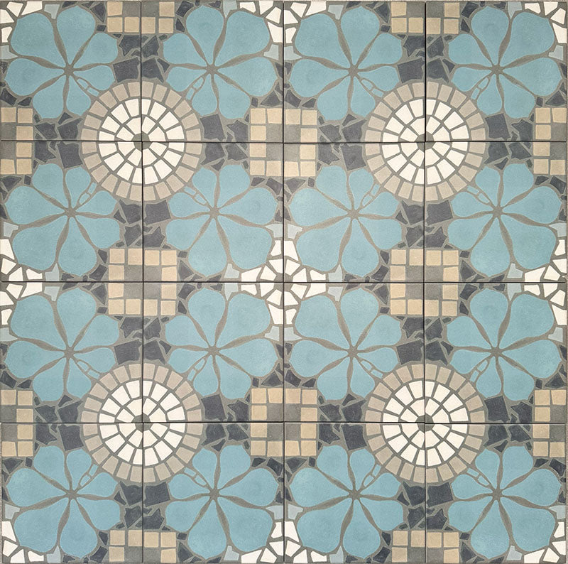 Nantes Azul Blue Moroccan-style patterned tiles displayed in a full repeating layout. The 20x20cm tiles feature soft blue floral motifs paired with circular mosaic detailing in cream, grey and stone tones, creating a traditional Moroccan-inspired design suitable for decorative floors and walls.