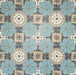 Nantes Azul Blue Moroccan-style patterned tiles displayed in a full repeating layout. The 20x20cm tiles feature soft blue floral motifs paired with circular mosaic detailing in cream, grey and stone tones, creating a traditional Moroccan-inspired design suitable for decorative floors and walls.
