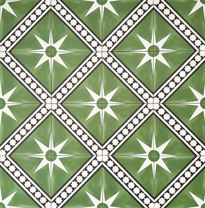 Gilgamesh Green Moroccan style 20x20cm patterned tiles, shown as a flat lay to highlight the repeating green, black and white geometric star pattern.