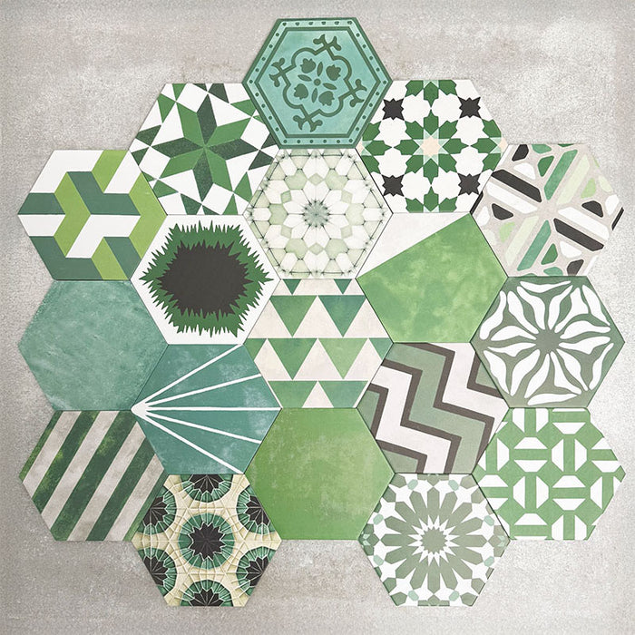 Fayrouz Verde Hexagon Patchwork Moroccan-style porcelain tiles in an 18.7 × 21.6cm hexagon format, showcasing a coordinated mix of geometric, starburst and zigzag patterns in layered green, sage, mint and charcoal tones, arranged as a decorative patchwork group to highlight colour variation and pattern diversity.