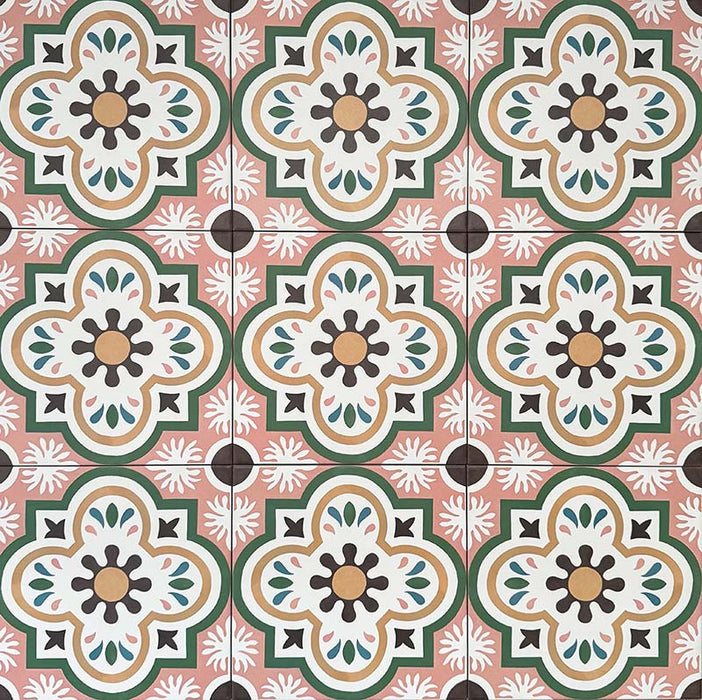 Cuba Paradise Moroccan-style porcelain tiles in a 20×20cm square format, arranged in a repeating floral pattern with coral pink backgrounds, green detailing and white and brown accents, showcasing the tile’s bold symmetry and decorative encaustic-style design.