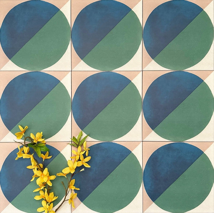 Abstract Ocean Patterned Tiles in a 20x20cm format, displayed in a repeated grid layout to showcase the bold geometric circular design. Deep blue and rich green tones are balanced with soft neutral corners, creating a fresh, contemporary look ideal for feature walls, floors or decorative splashbacks.