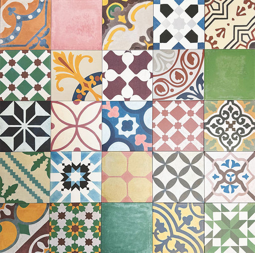 Fayrouz Patchwork 20×20cm Moroccan-style porcelain tiles arranged in a colourful patchwork mix of geometric and floral patterns, featuring rich tones of blue, green, pink and warm neutrals.