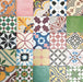 Fayrouz Patchwork 20×20cm Moroccan-style porcelain tiles arranged in a colourful patchwork mix of geometric and floral patterns, featuring rich tones of blue, green, pink and warm neutrals.