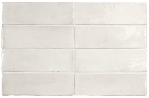 Benomar White Moroccan Mini Brick Gloss Tile 5x15cm shown in a classic brick layout, featuring soft white tones with subtle handcrafted effect variation and a high gloss finish, ideal for kitchen splashbacks and bathroom walls.