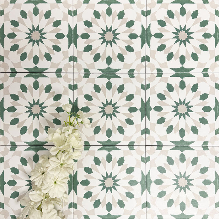Souk Green A 20×20cm Moroccan-style porcelain tiles arranged in a green, white and beige geometric pattern.