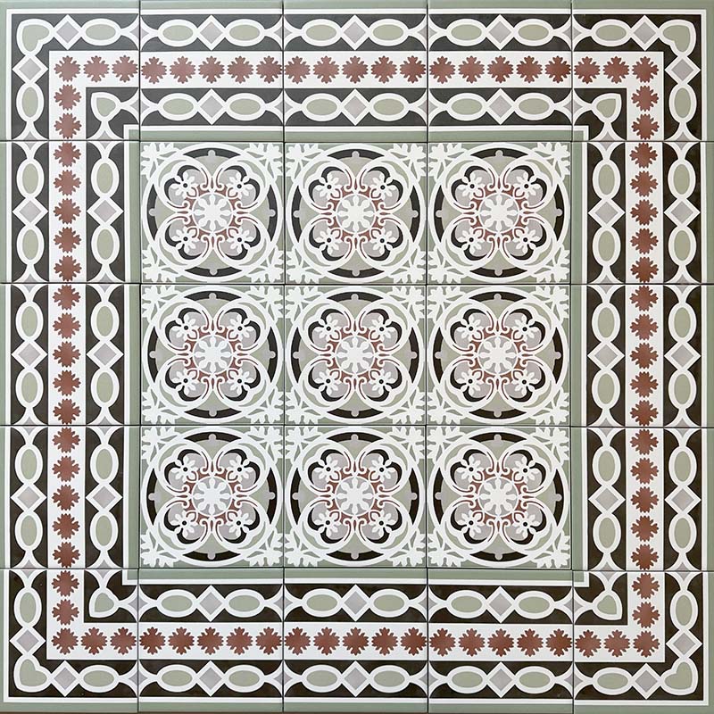 Decorative floor layout featuring Imperial Victorian Green Mini Border Tiles, 15x15cm porcelain tiles arranged around matching patterned centre tiles to create a detailed Victorian-inspired floor design.
