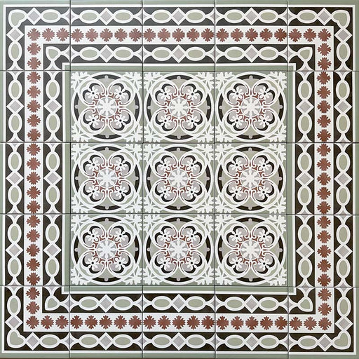 Decorative floor layout featuring Imperial Victorian Green Mini Border Tiles, 15x15cm porcelain tiles arranged around matching patterned centre tiles to create a detailed Victorian-inspired floor design.