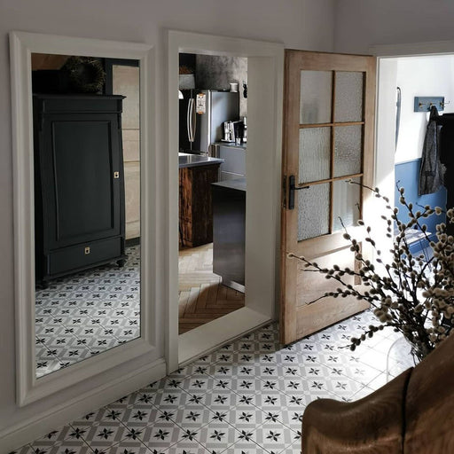 Hallway featuring Canterbury Star Victorian-style porcelain floor tiles in a 20 × 20cm format, laid in a repeating star pattern and paired with painted cabinetry, timber doors and soft neutral tones to create a characterful yet timeless entrance space.
