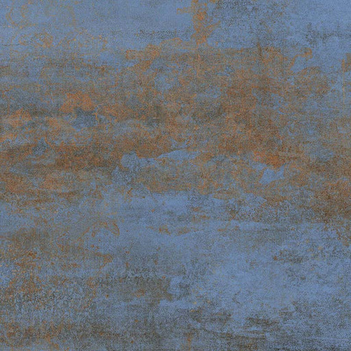 Close-up of Iron Blue Oxide Metallic 60 × 60cm porcelain tile, showcasing layered blue tones with warm rust-like oxidation, soft tonal variation, and a gently textured metallic effect for a bold, industrial-inspired finish.