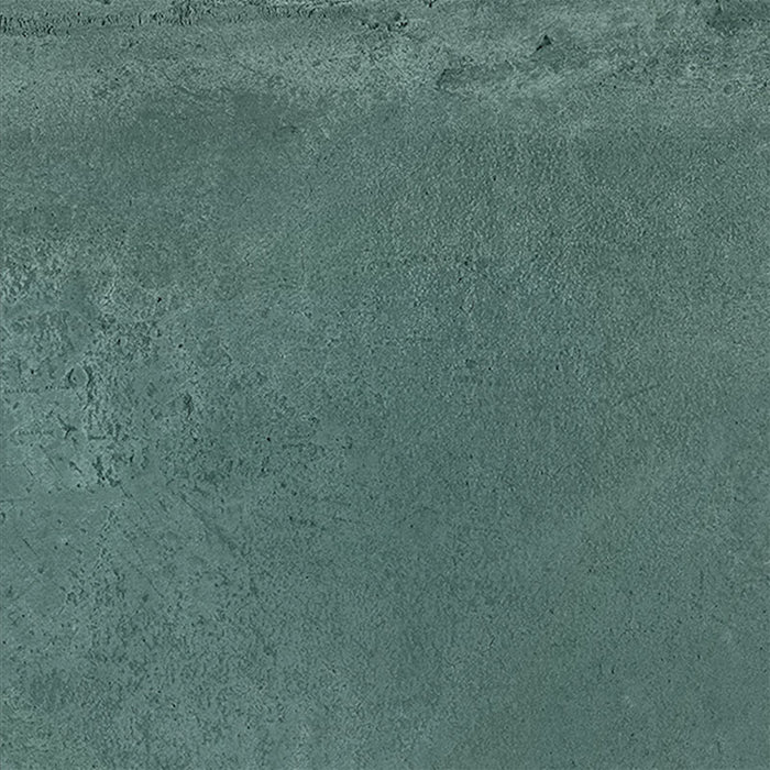 Close-up of Iron Emerald Green Oxide Metallic 80 × 80cm porcelain tile, showcasing deep green tones with soft tonal variation, a gently textured surface, and a subtle metallic effect that brings depth and a contemporary, industrial-inspired finish to interior spaces.