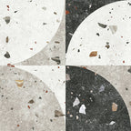 Flat lay of Jericho Decor Terrazzo 66 × 66cm porcelain wall and floor tile, featuring a terrazzo base with multicoloured aggregate chips combined with bold geometric quarter-circle patterning in contrasting light and dark tones, creating a striking, contemporary statement design.