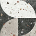Flat lay of Jericho Decor Terrazzo 66 × 66cm porcelain wall and floor tile, featuring a terrazzo base with multicoloured aggregate chips combined with bold geometric quarter-circle patterning in contrasting light and dark tones, creating a striking, contemporary statement design.