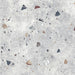 Flat lay of Jericho Silver Terrazzo 66 × 66cm porcelain wall and floor tile, featuring a soft grey base with scattered multicoloured aggregate chips in varied sizes, creating a balanced, contemporary terrazzo effect with subtle movement and texture.