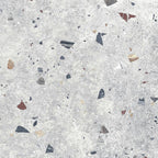 Flat lay of Jericho Silver Terrazzo 66 × 66cm porcelain wall and floor tile, featuring a soft grey base with scattered multicoloured aggregate chips in varied sizes, creating a balanced, contemporary terrazzo effect with subtle movement and texture.