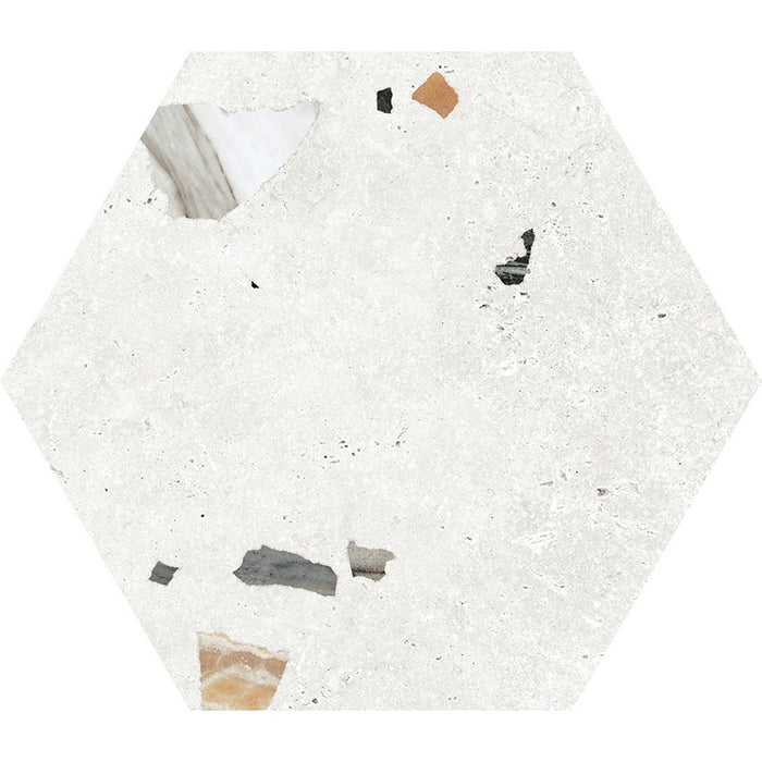 Flat lay of Jericho White Terrazzo Hexagon 25 × 22cm porcelain wall and floor tile, featuring a crisp white base with scattered multicoloured aggregate chips in varied sizes, creating a clean, contemporary terrazzo effect with subtle texture and movement.