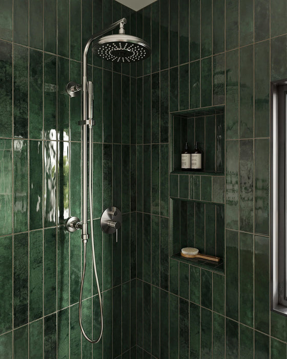 Walk-in shower featuring Jumairah Pine Forest Green 5 × 40cm gloss ceramic wall tiles, laid vertically with deep green tonal variation, paired with chrome shower fittings, recessed niches, and a clean, modern layout.