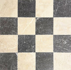 Chequerboard layout featuring Fayrouz Latte Foam 15.2x15.2cm natural marble tiles with a tumbled finish, paired with dark grey marble tiles, creating a bold, classic grid with strong contrast and natural veining.