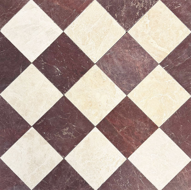 Chequerboard layout featuring Fayrouz Burgundy Red 15.2x15.2cm natural marble tiles with a tumbled finish, paired with light cream marble tiles, installed on a diagonal to create a classic, contrasting floor design.