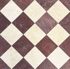 Chequerboard layout featuring Fayrouz Latte Foam 15.2x15.2cm natural marble tiles with a tumbled finish, paired with Burgundy Red marble tiles, installed diagonally to create a timeless, high-contrast floor design.