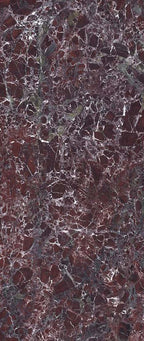 Close-up of Levant Rouge Polished Marble effect 60 × 120cm porcelain tile, showcasing a deep red base with intricate white veining and subtle tonal variation, creating a bold, natural stone-inspired finish.