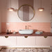 Liberty Blush Pink 7.5cm x 15cm rustic effect gloss wall tiles, featuring a soft blush pink finish with subtle surface variation, paired with a terrazzo effect worktop, pale pink cabinetry and warm brass details.