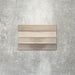 Close-up of Lisbon Grey 5cm x 30cm artisanal porcelain wall tiles arranged horizontally, showcasing warm grey and taupe tones, subtle tonal variation and a handcrafted-effect surface finish.