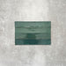 Close-up of Lisbon Verde Green 5cm x 30cm artisanal porcelain wall tiles arranged horizontally, showcasing rich green tones, subtle tonal variation and a glossy handcrafted-effect surface finish.