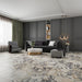 Living room interior featuring Fayrouz Picasso 30.5x61cm natural marble tiles with a honed finish, installed across the floor to showcase a white base with dramatic grey and warm gold veining, creating a bold, statement surface with rich natural variation.