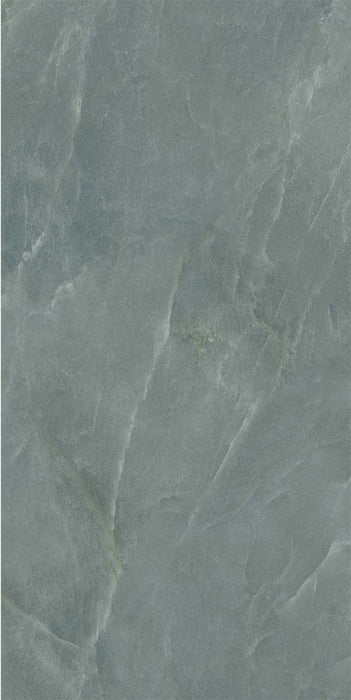 Flat lay of Lucca Ocean Green Natural Matt 60 × 120cm porcelain wall and floor tile, showcasing soft green marble-effect shading with subtle natural veining and a refined stone-inspired matt surface finish.