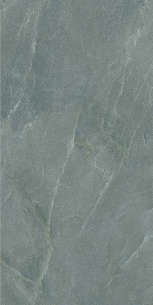 Flat lay of Lucca Ocean Green Natural Matt 60 × 120cm porcelain wall and floor tile, showcasing soft green marble-effect shading with subtle natural veining and a refined stone-inspired matt surface finish.