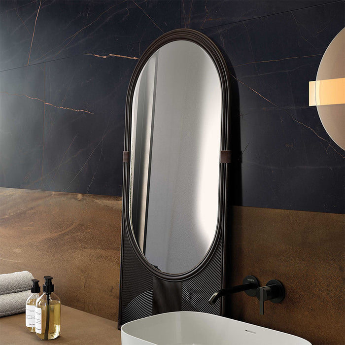 Contemporary bathroom interior featuring Lucca Precious Noir Lux 3D 60 × 120cm porcelain wall and floor tiles, combining deep black marble-effect surfaces with subtle gold veining, warm bronze tones, and minimalist fittings for a sophisticated luxury aesthetic.