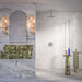 Luxury bathroom featuring Lucca Quartz Matt 60 × 120cm porcelain wall and floor tiles, styled with soft marble-effect veining, green stone vanity details, textured white wall tiles, and elegant contemporary finishes.