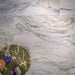 Close-up of Lucca Quartz Matt 60 × 120cm porcelain wall and floor tiles, showcasing flowing marble-effect veining in soft grey, cream, and blue tones with a refined natural stone-inspired finish.