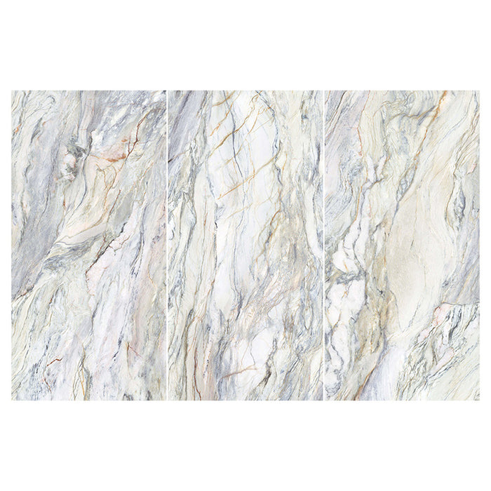 Flat lay of Lucca Quartz Matt 60 × 120cm porcelain wall and floor tiles, featuring flowing marble-effect veining in soft grey, cream, and blue tones with a sophisticated natural stone-inspired finish.